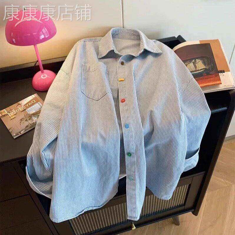 蓝色条纹长袖衬衫女春秋上衣2026新款外搭宽松设计感撞色外套衬衫