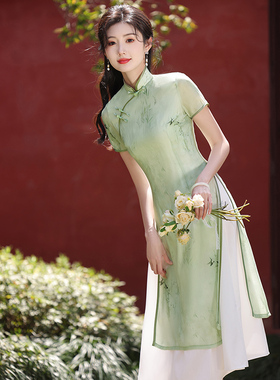 旗袍新款2025夏季高考送考绿色妈妈年轻款女新中式奥黛连衣裙高端