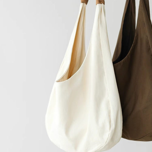 设计感小众帆布包女2025新款休闲慵懒松弛感斜挎包日系单肩大包包