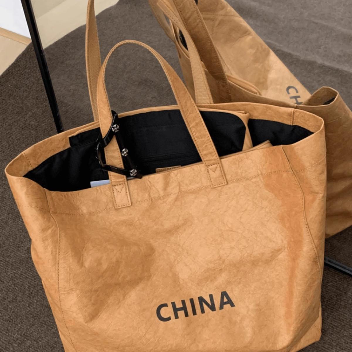 韩系ins时尚简约大容量小众手提单肩防水拉链旅行包单肩通勤软面