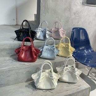 韩国小众蝴蝶结菜篮子手提包包女2025新款高级感水桶包单肩斜挎包