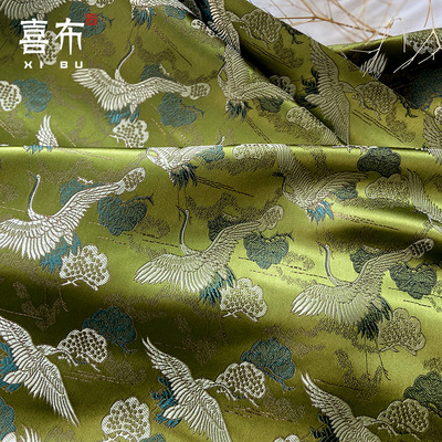 墨绿色祥云朵松树仙鹤织锦缎布料