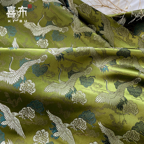 墨绿色祥云朵松树仙鹤织锦缎布料
