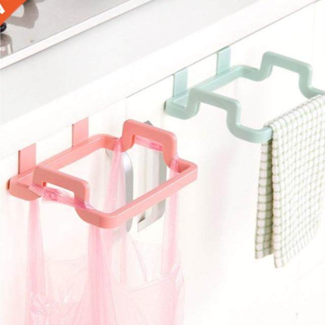 household kitchen rectangular garbage can behind the plastic