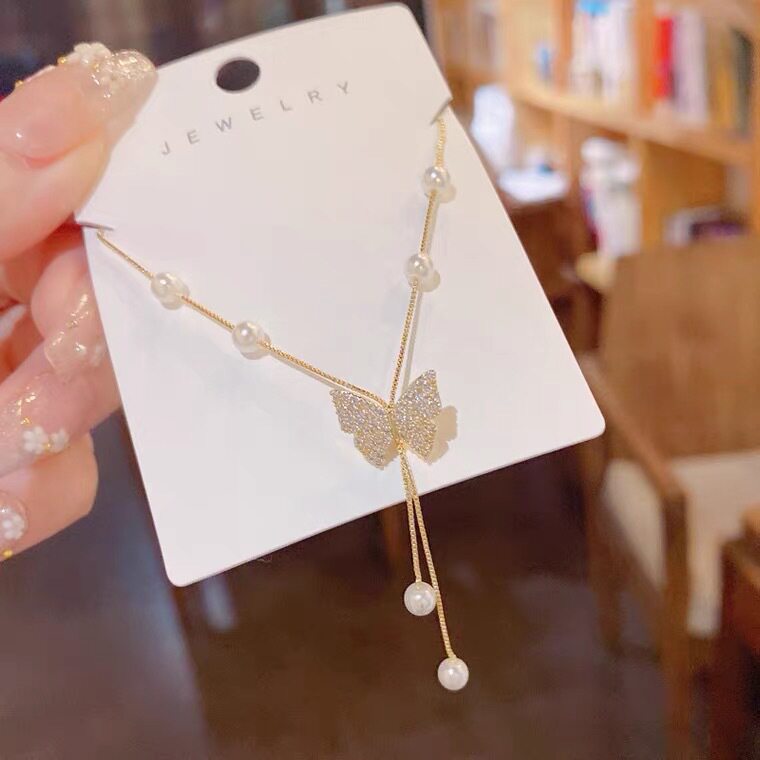 小众高级纯欲蝴蝶抽拉珍珠项链女夏季轻奢设计感颈链锁骨链配饰