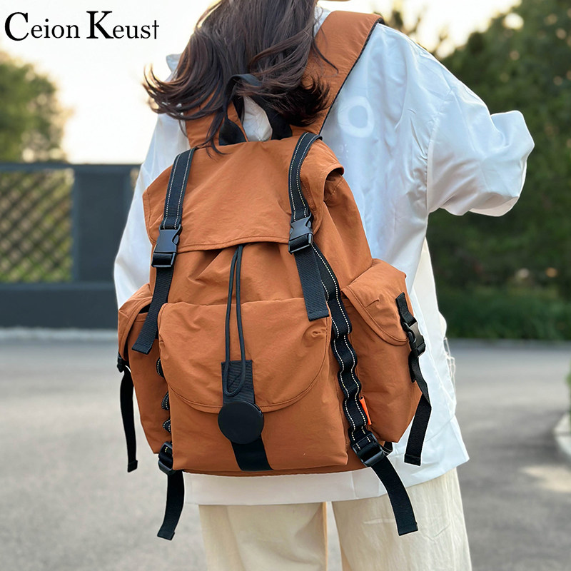 CeionKeust新款户外大容量防水双肩包女旅行登山电脑包男学生书包