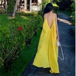 官方泰国度假穿搭黄色露背吊带连衣裙女夏海边度假飘逸长裙拍照超