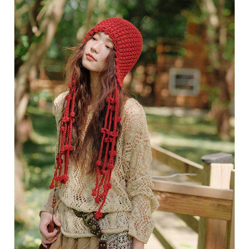 秋冬保暖女针织帽子手工编织镂空包头帽民族风流苏护耳套头毛线帽