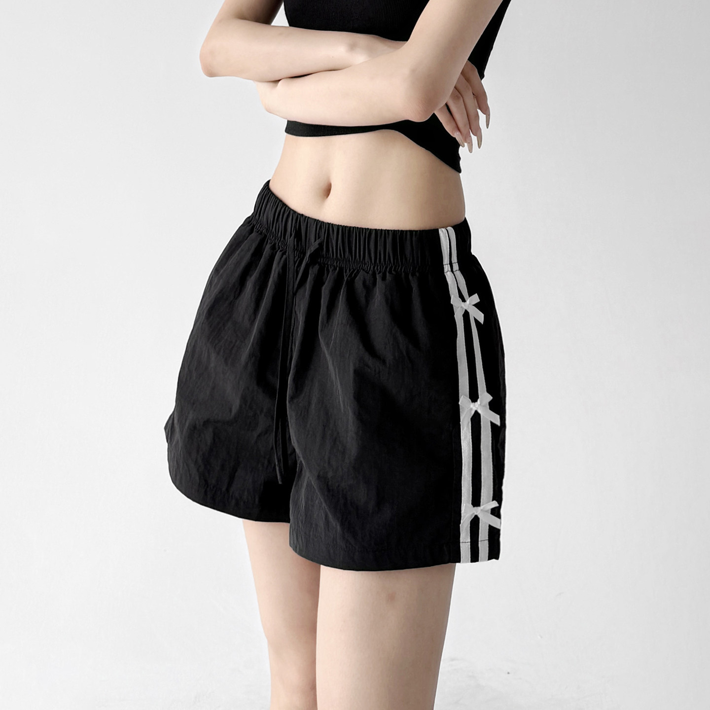 黑色速干运动短裤女2026夏季新品薄款蝴蝶结宽松女士显瘦休闲裤子图片
