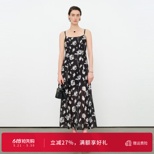 黑白花吊带连衣裙