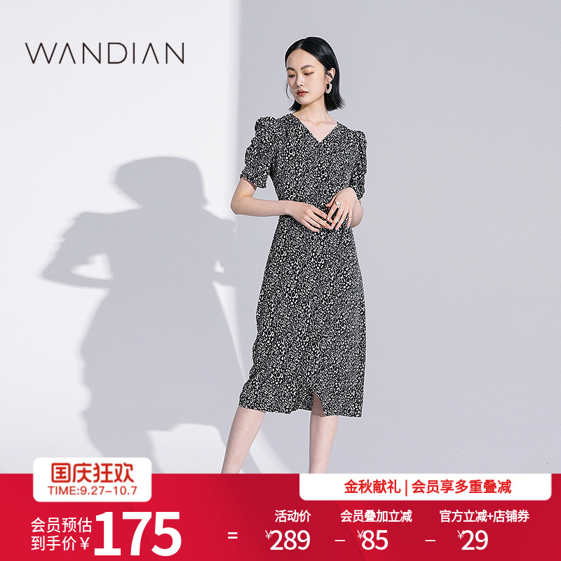 婉甸黑底波点不规则V领连衣裙