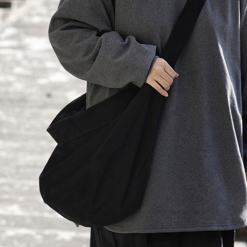 阿于呆复古双拉链大容量单肩包