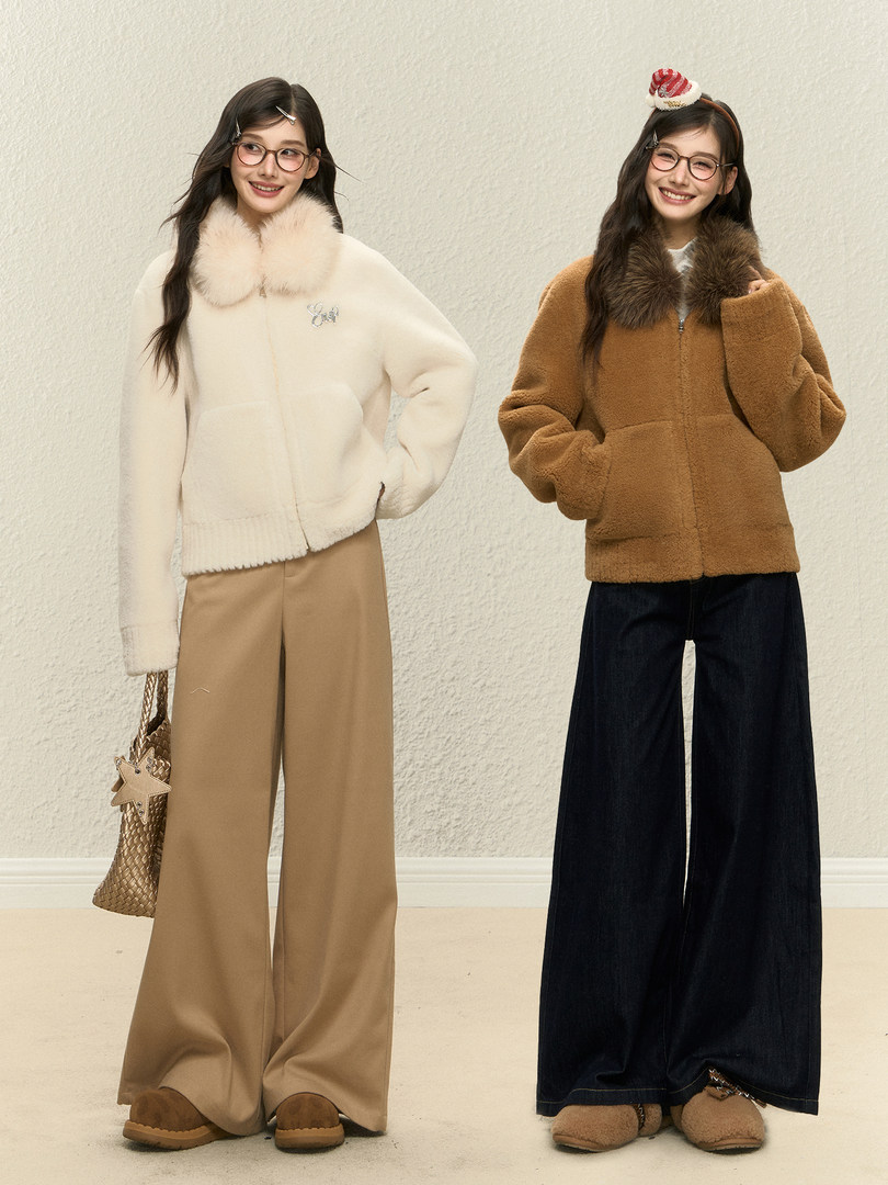 Two women wearing cozy faux-fur winter jackets with wide-leg pants
