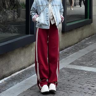 今年流行款的运动裤子女2025新款秋冬季加绒加厚红色条纹阔腿卫裤