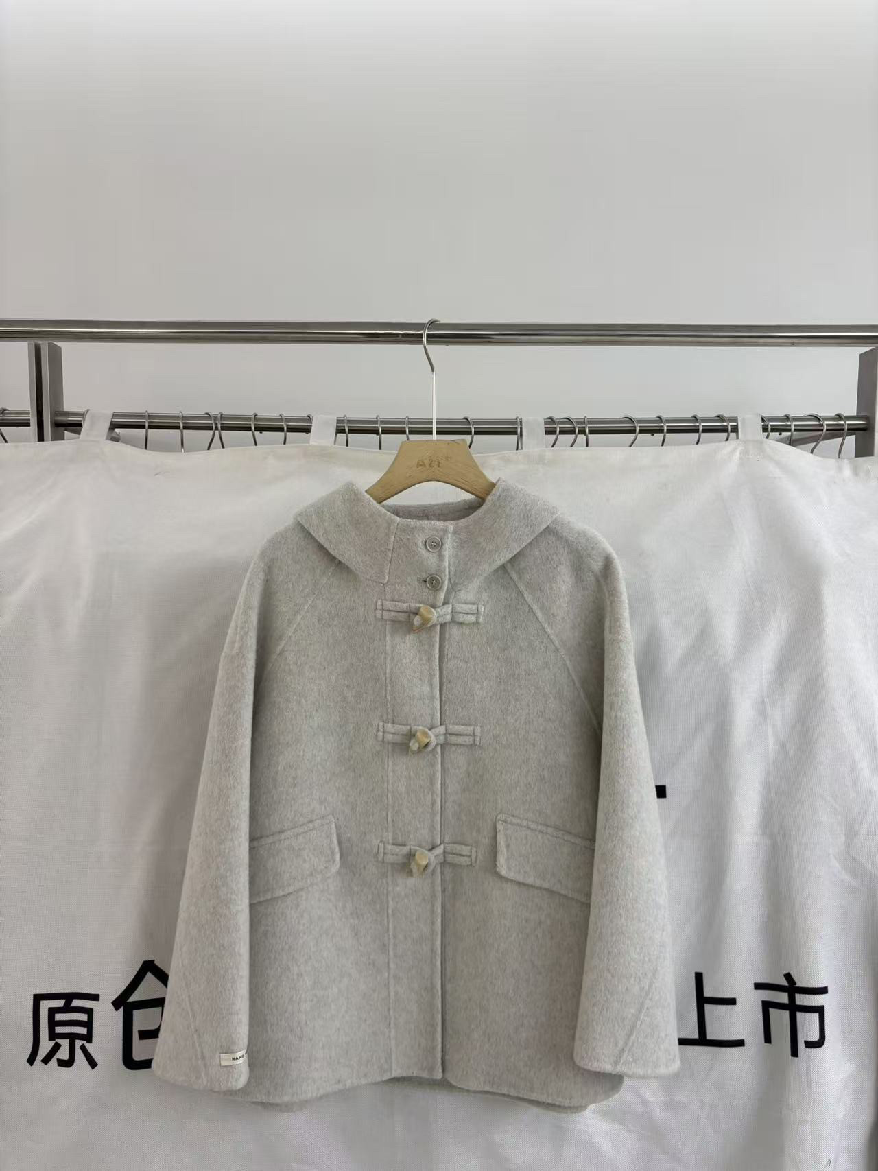 欧洲站2025年冬季新款女装正品时尚连帽插肩袖双面羊毛呢大衣外套