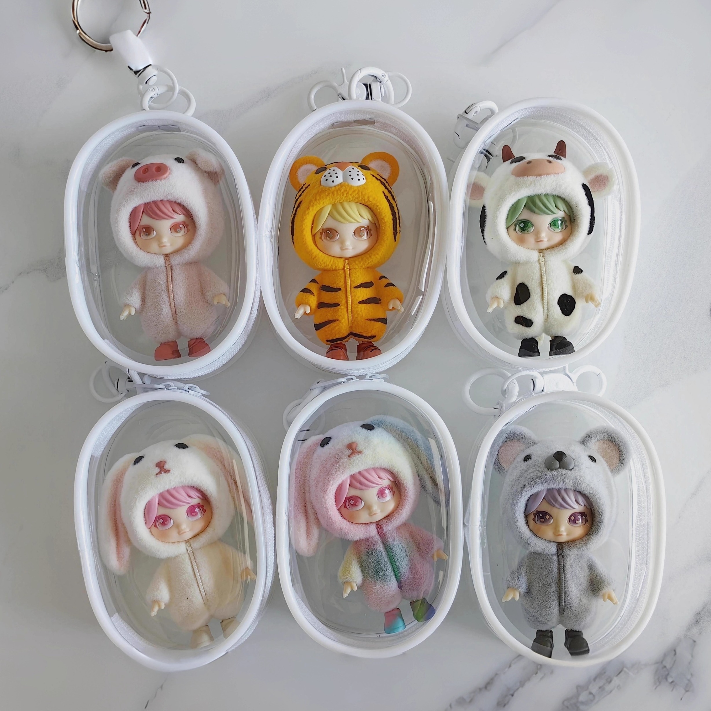 溜娃包痛包盲盒手办通用收纳展示透明耳机数据线收纳包外出便携