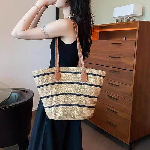 编织包单肩包大容量女2024新款通勤包托特包海边水桶包草编包百搭