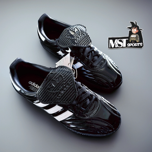 Adidas黑白女子薄底低帮休闲板鞋