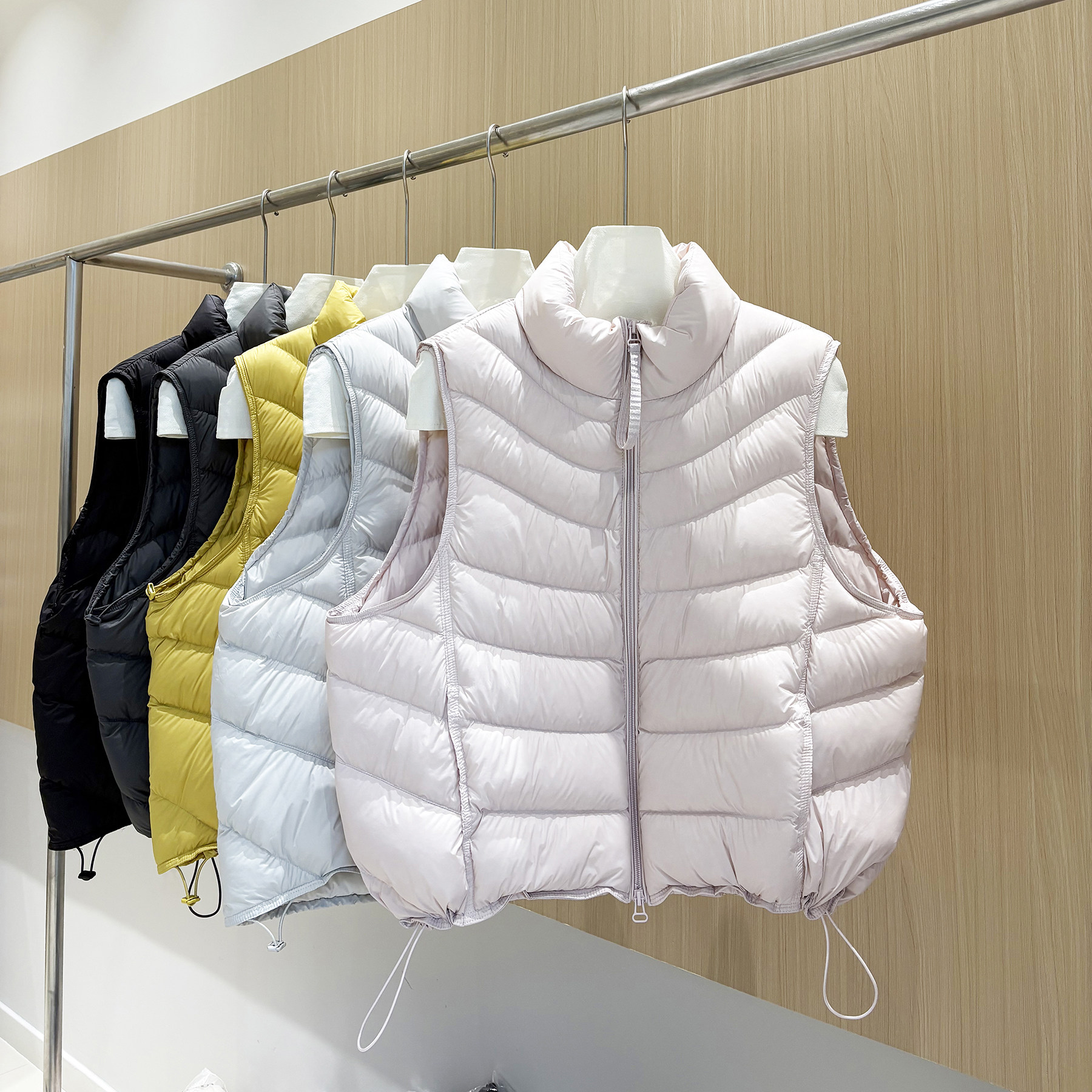 90白鸭绒秋冬时尚抽绳排骨立领羽绒服女马甲短款背心冬装外套