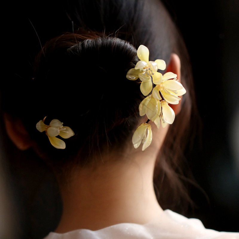 茶服嫩黄色玉兰花发饰图片