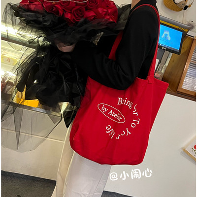 小闹心 复古正红色简约字母印花单肩帆布包大容量学生百搭手提袋