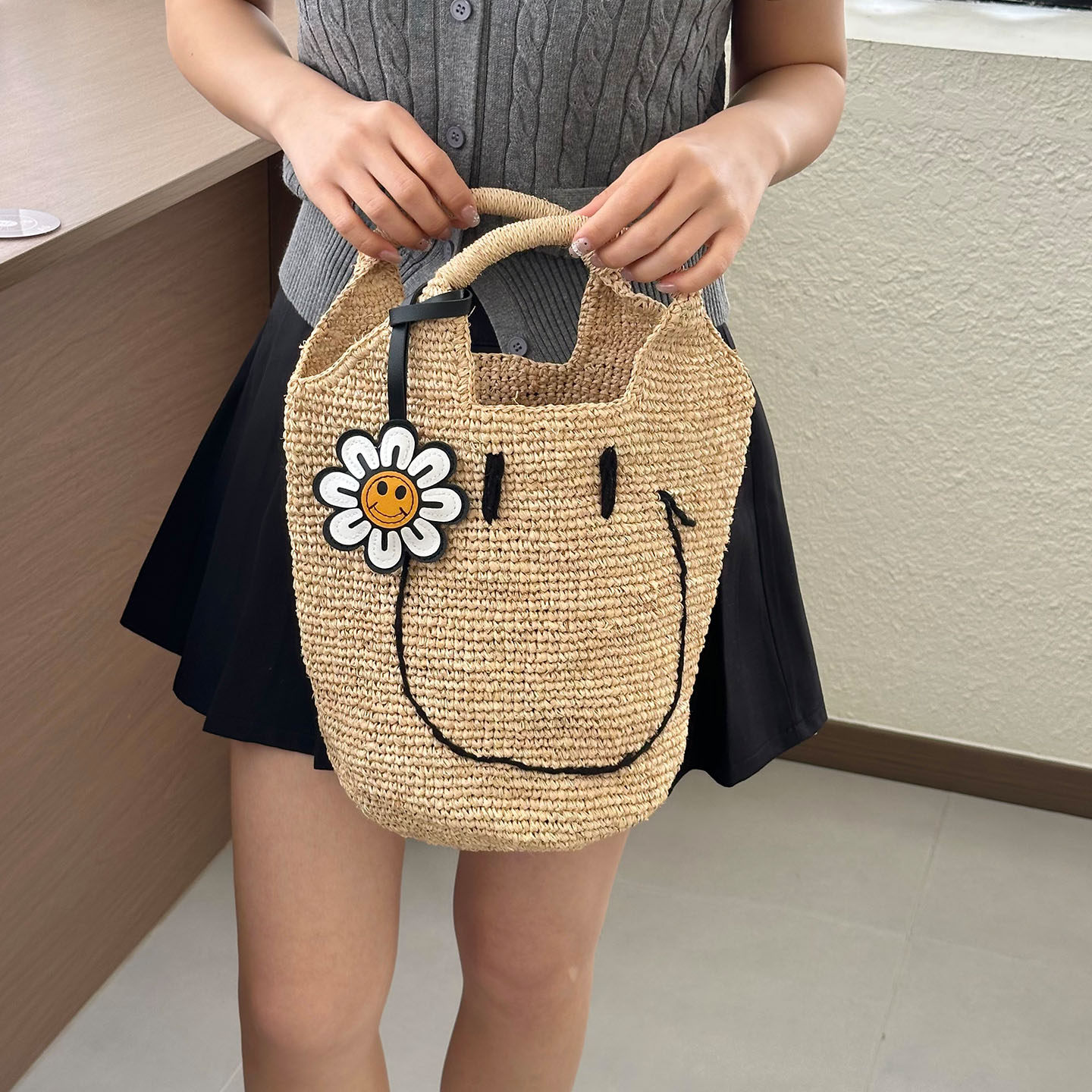 大容量韩版笑脸草编包2026新款女通勤海边度假手提包包休闲气质