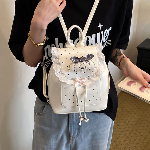 可爱波点双肩包女2026新款蕾丝夏天流行卡通背包百搭休闲通勤书包