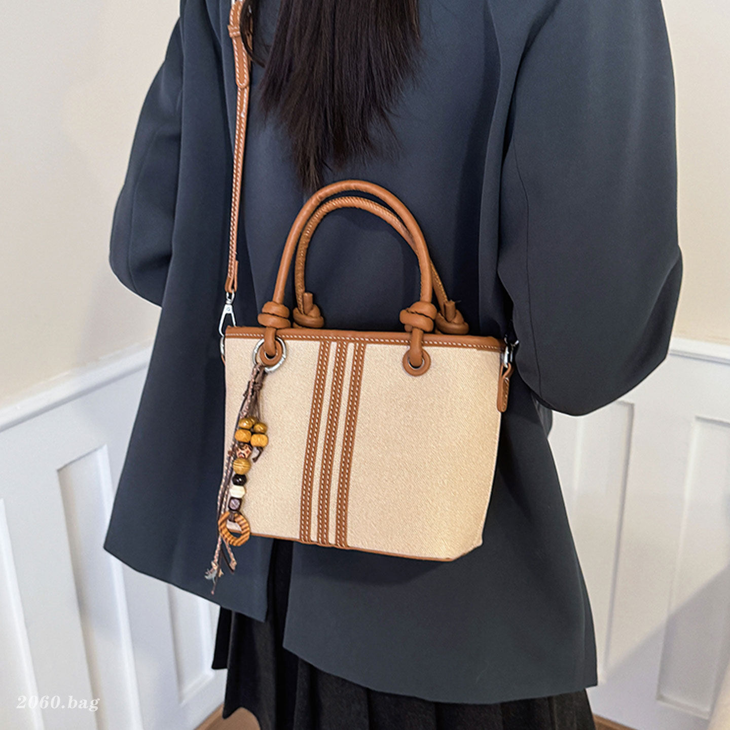 韩系小众设计水桶包女2026新款简约通勤单肩斜挎休闲复古手提包,箱包皮具/热销女包/男包,水桶包,淘宝优惠券,粉丝福利购,淘宝优惠卷