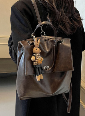 大学生上课简约轻便双肩包包女2025秋季新款大容量通勤手提水桶包