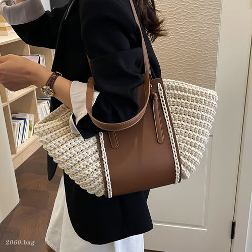 夏季编织水桶包女2026新款单肩手提包大容量轻奢小众通勤包高级感