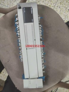 三菱PLCFX3U-128MR橙色实物图带个扩展模块
