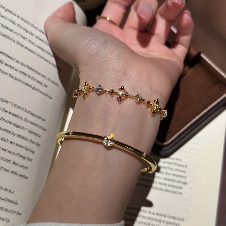 金色鸢尾花十字架锆石手链女轻奢高级感小众设计精致星轨叠戴手镯