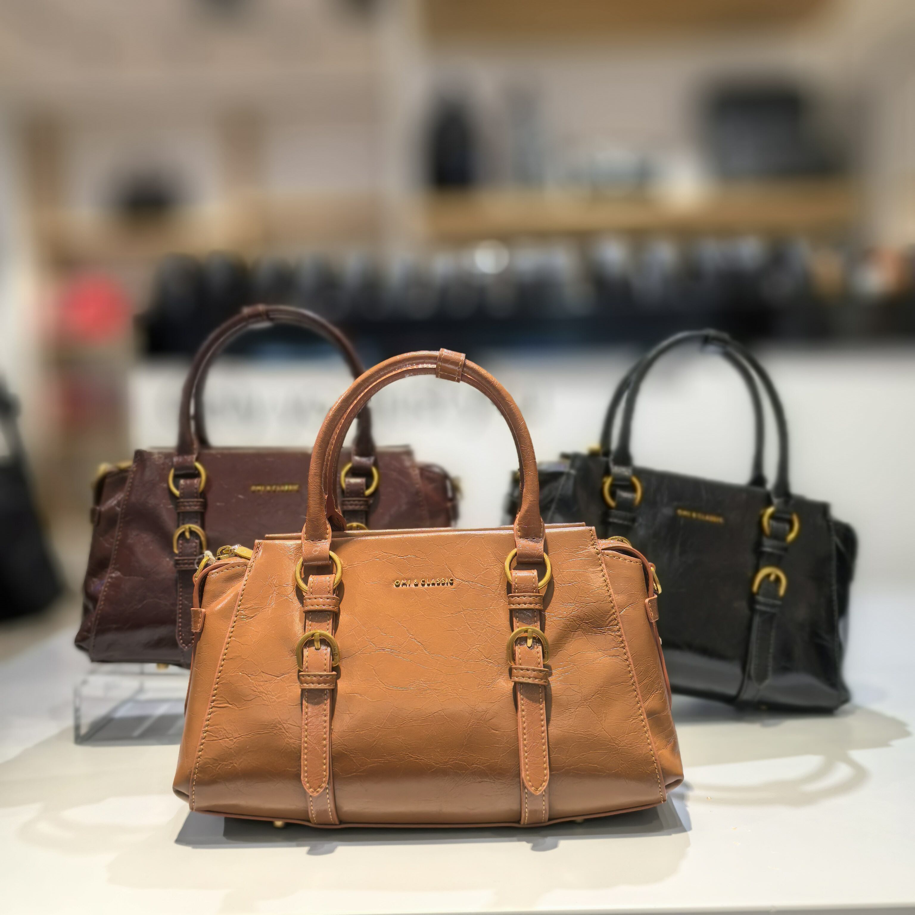 OMI欧米门店新款头层牛皮手提斜挎高质感女包