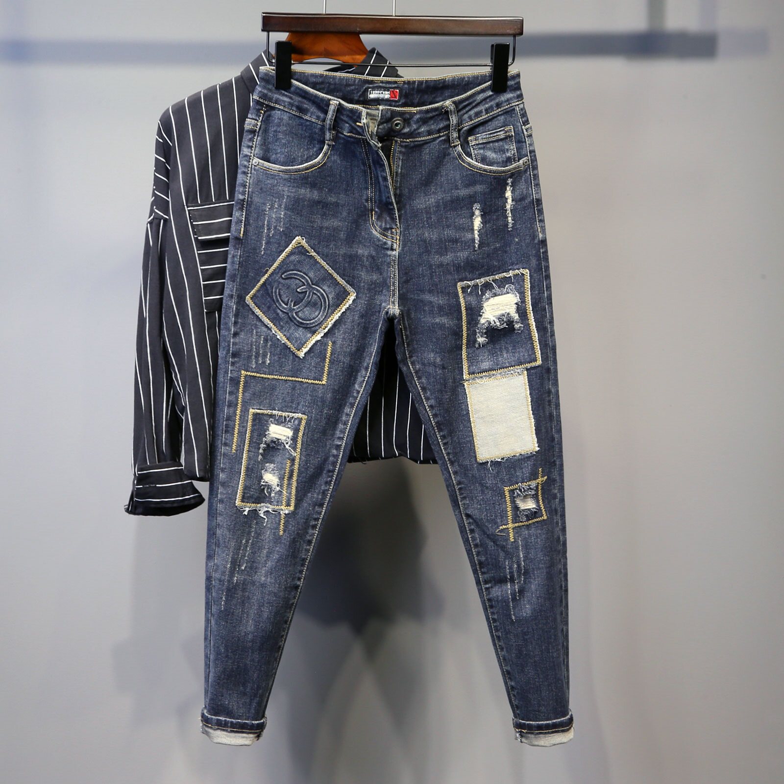 潮牌新款个性破洞乞丐补丁贴布牛仔裤男士青年拼接针缝修身小脚裤