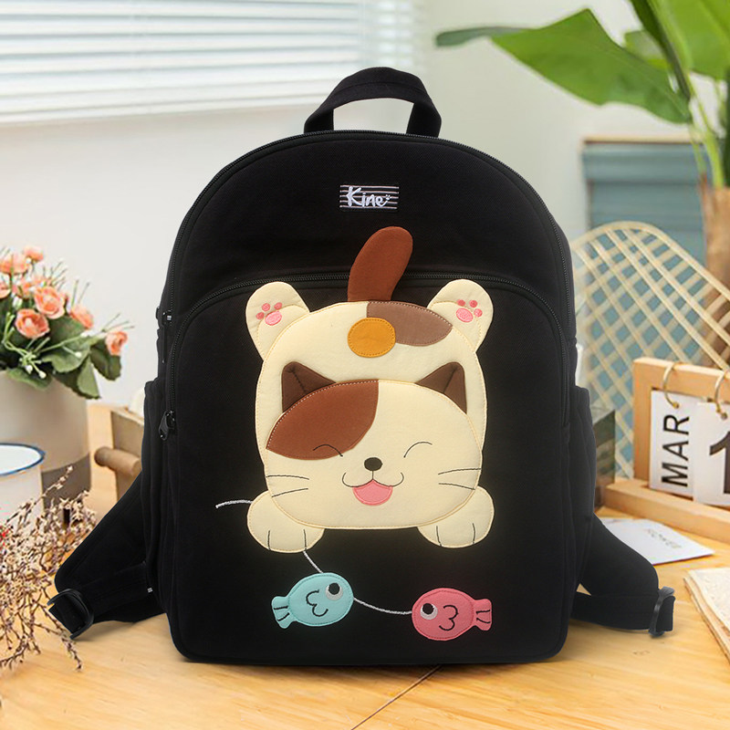 进口戏鱼猫帆布双肩包15寸电脑包女大容量学生书包初中生轻便护脊