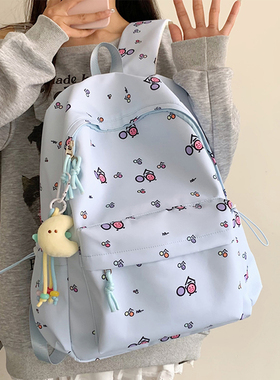 书包女生小学生蓝色印花双肩包初中生上课痛包补课背包时尚轻便包