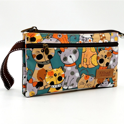 咔咔部落手拿包热卖防水防污三层