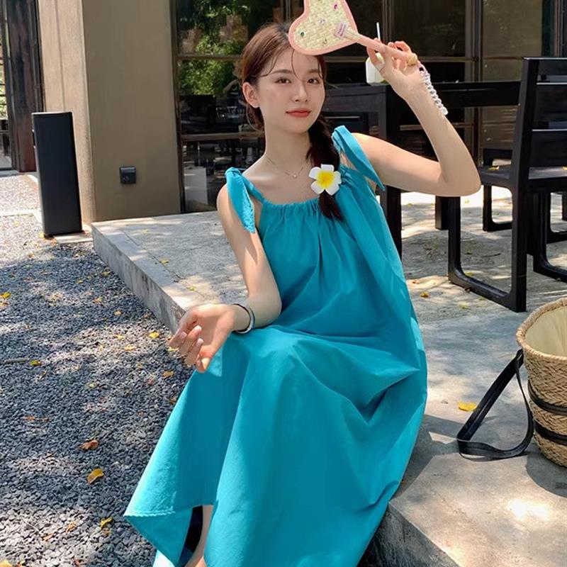 度假风系带吊带连衣裙女夏季2025新款宽松显瘦A字裙蓝色中长裙子