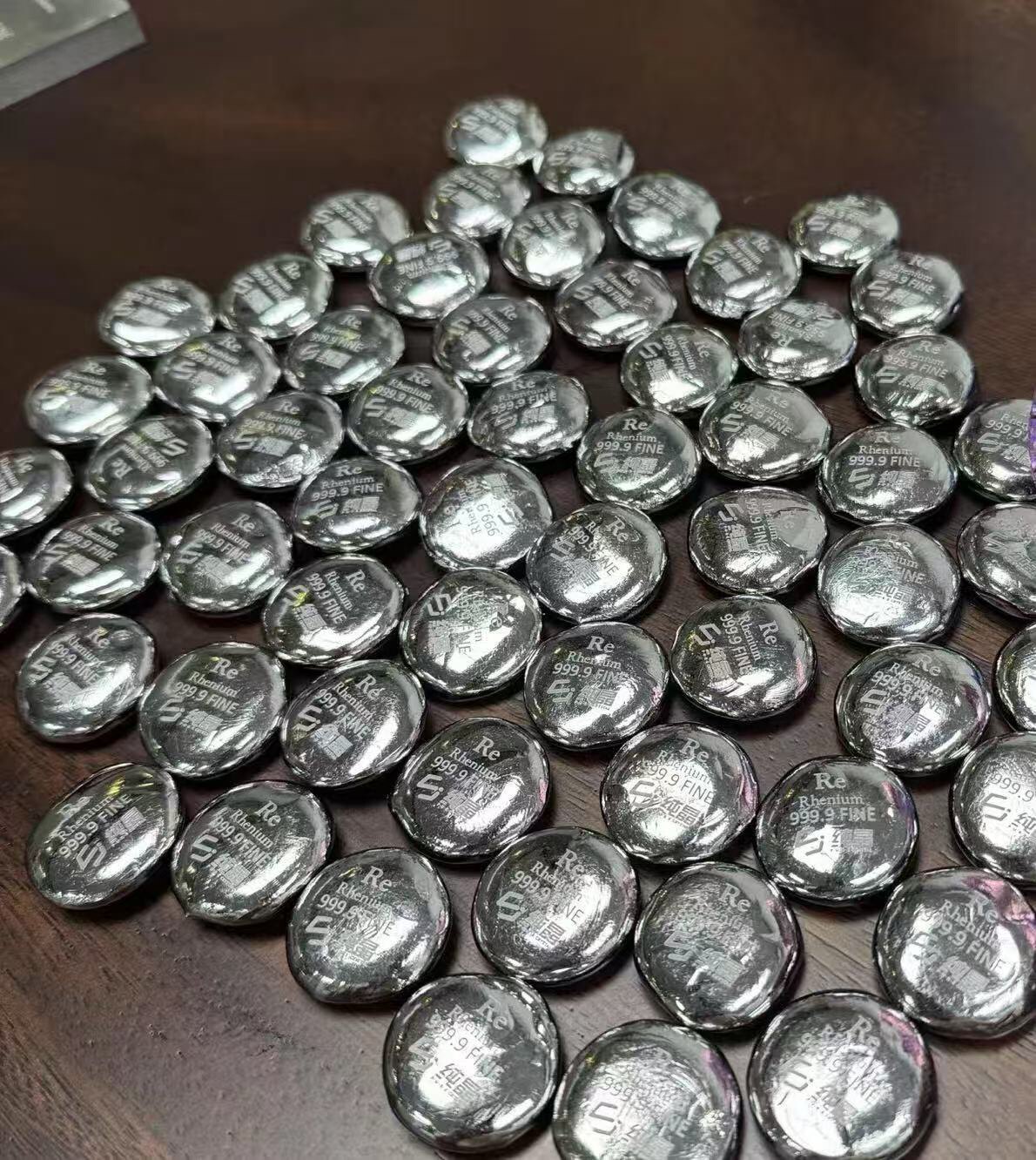 纯晶大品牌金属铼9999纯度纽扣铼锭一粒100克左右起售,量大价优