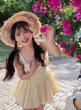 黄色波点吊带连衣裙女夏季新款法式甜美蝴蝶结收腰显瘦花苞短裙子