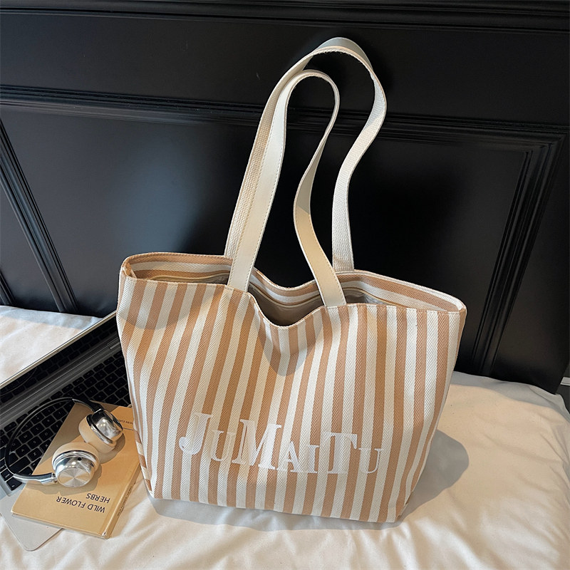 清新文艺条纹帆布托特包2025新款大容量通勤拉链单肩包休闲大包女