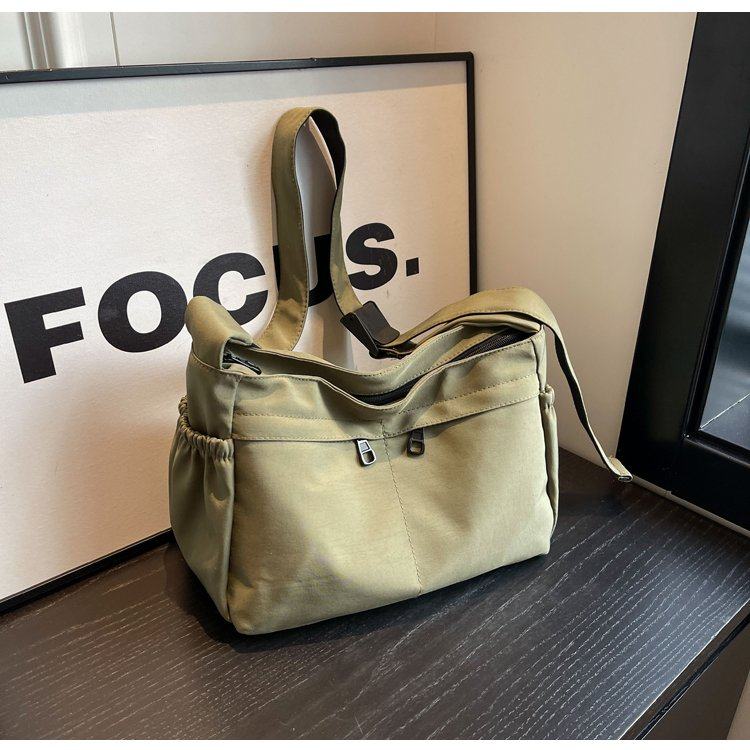 纯色文艺百搭斜挎包2025新款洋气拉链布包ins慵懒风中性单肩包女