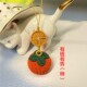 手工编织金钱币柿子莲花挂件有钱有势花手机包挂好运连连新年挂饰