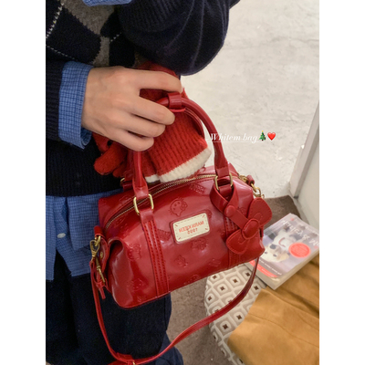 红色手提包包女式2025新款百搭ins可爱枕头包韩系小众通勤斜挎包