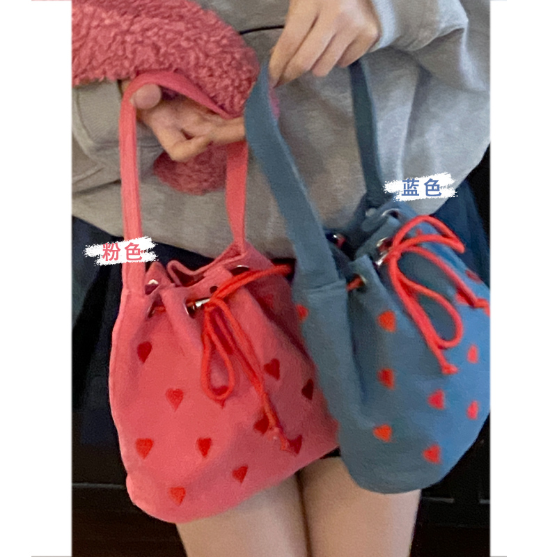 卡乐儿时尚潮流水桶包