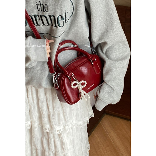 手拎红色包包女新年包2024新款潮韩国保龄球包百搭斜挎包小方包