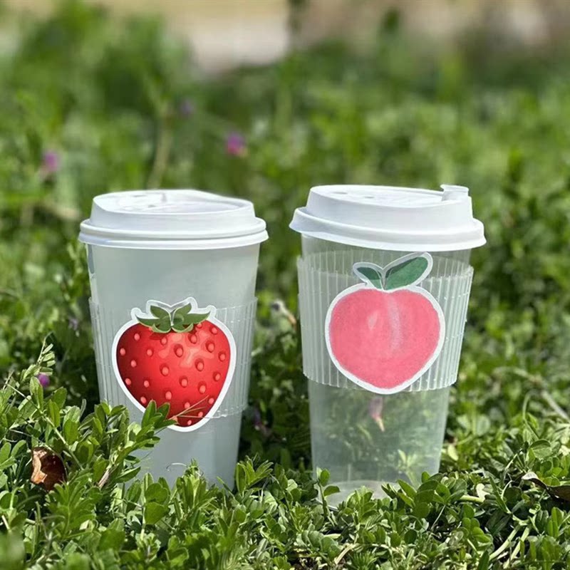 奶茶杯套定制logo樱花带卡槽现货 隔热专用水果隔冰塑料透明杯套图片