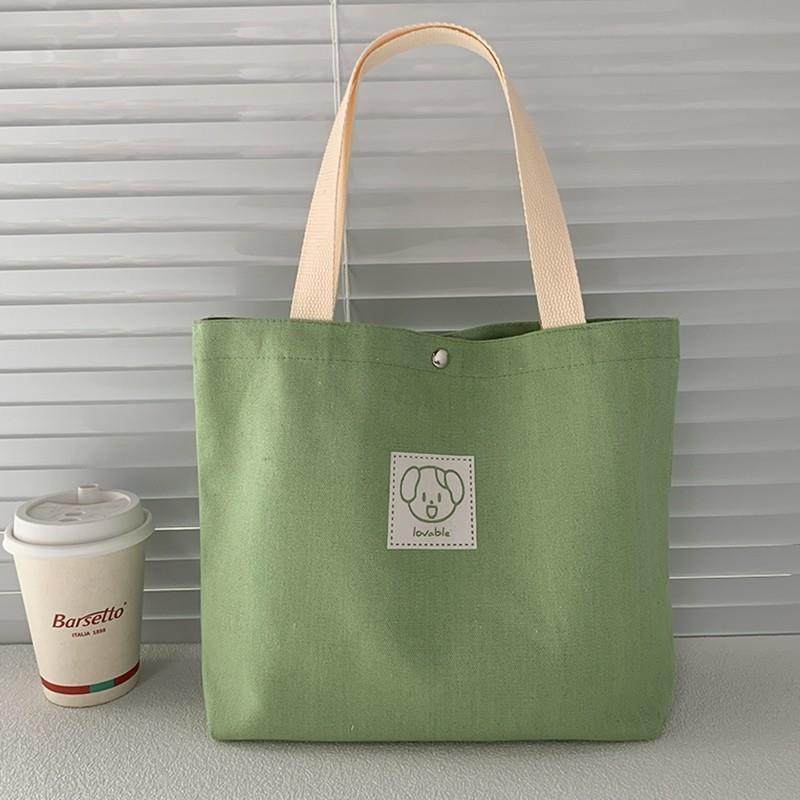 上班族小拎袋高级感帆布包女2024年新款加大容量简约布袋族通勤包