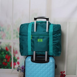 韩版旅行收纳袋手提衣物装可套行李箱拉杆上的包防水便携衣服袋子