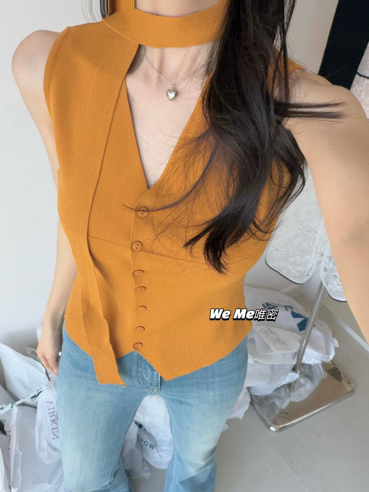 WEME2026春夏韩版气质V领无袖一排扣针织背心女修身显瘦百搭上衣